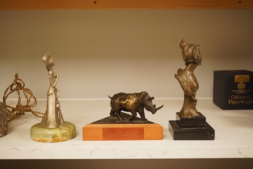 A bronzed rhino, a similar Art Nouveau style lady, and another, largest 19cm high